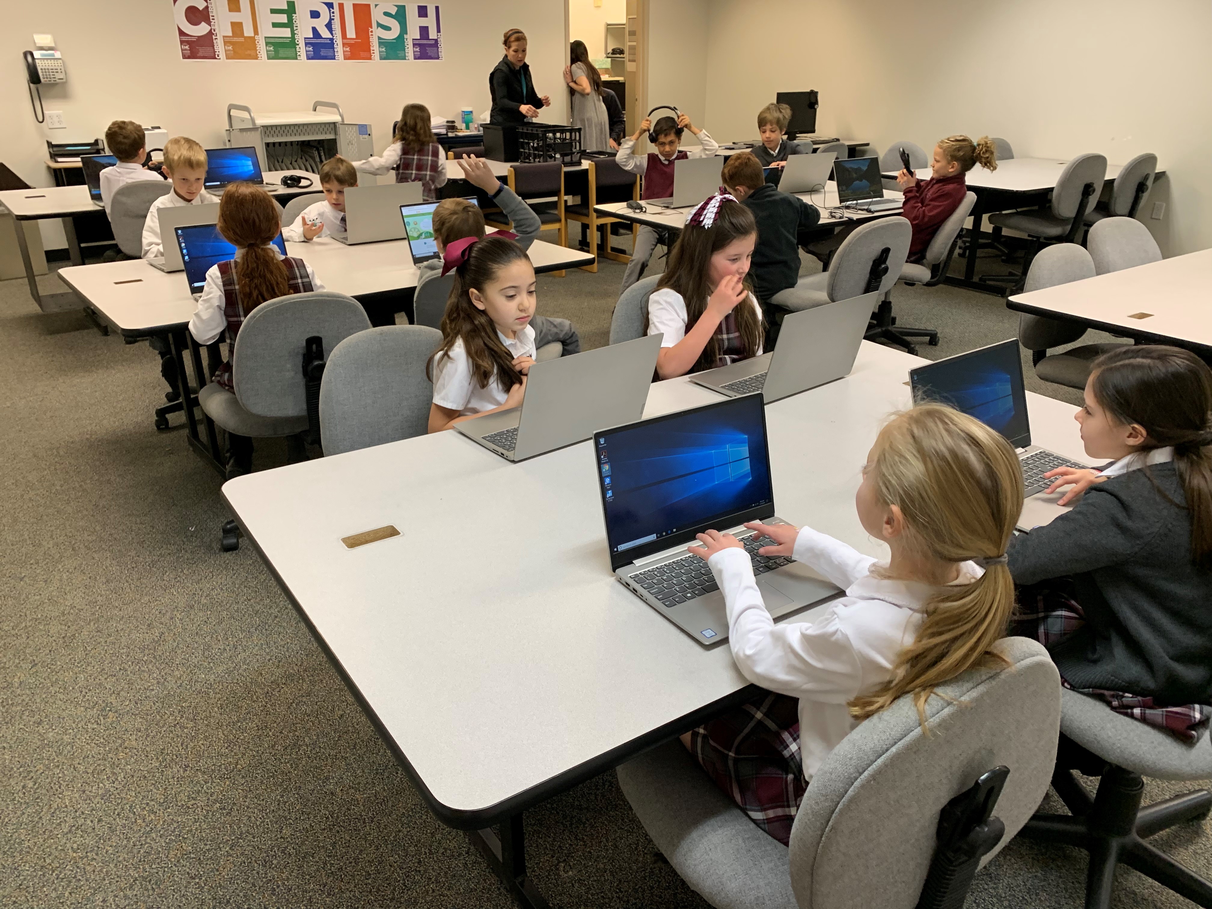 Vista Ridge Academy students use their new computer lab, funded in part by Versacare.