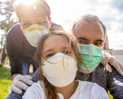 stock photo of family wearing masks