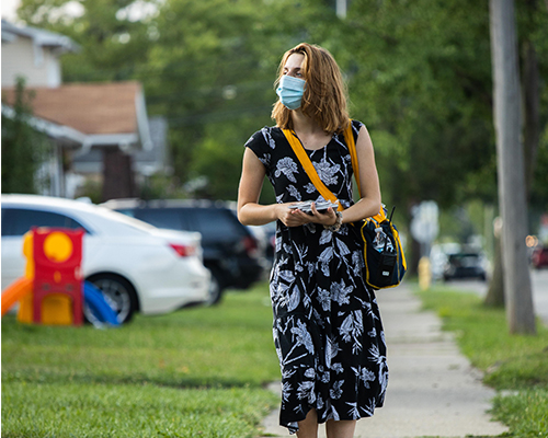 Michigan Youth Rush member canvasses in a neighborhood in Dearborn, Michigan