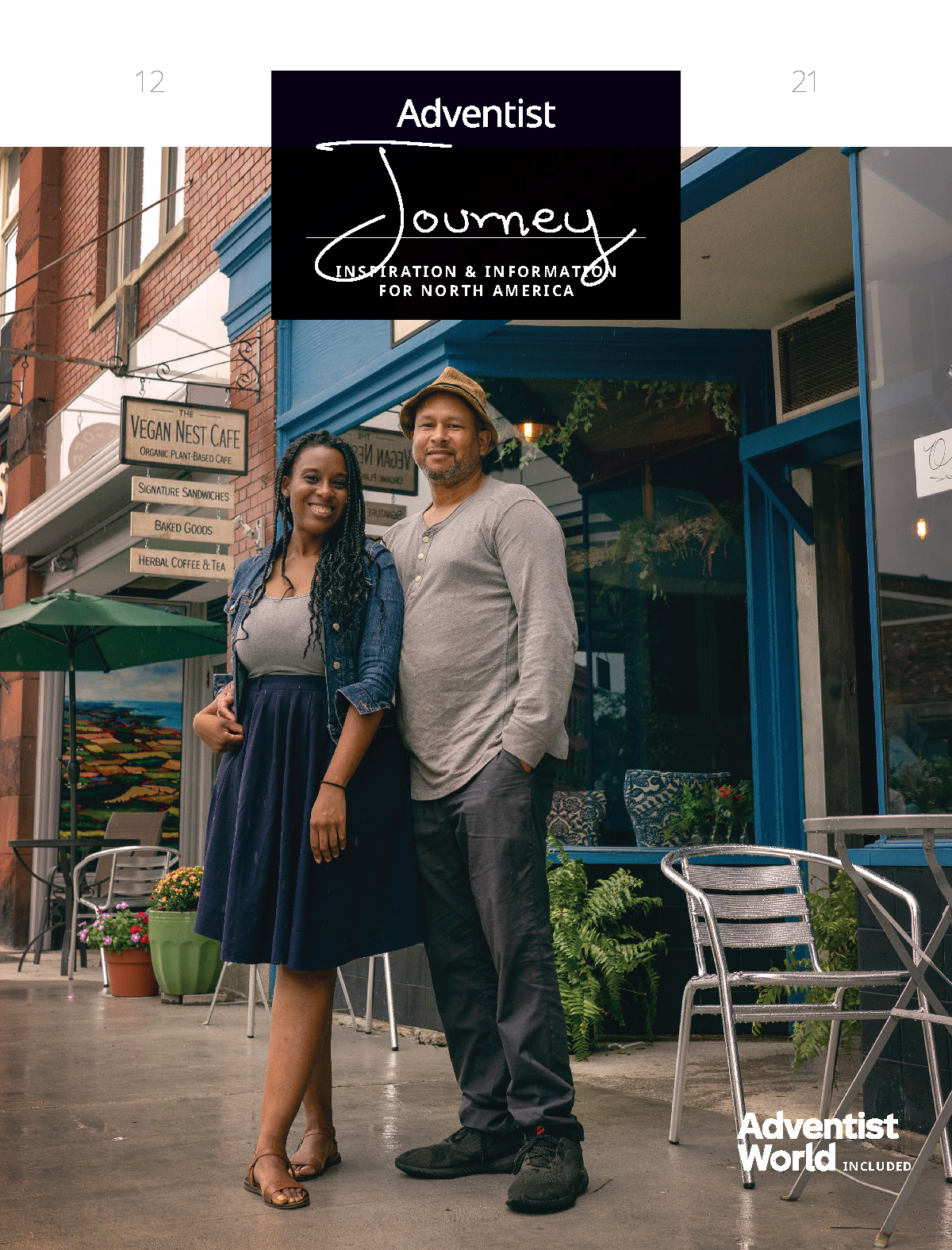 Woman and man standing in front of a café