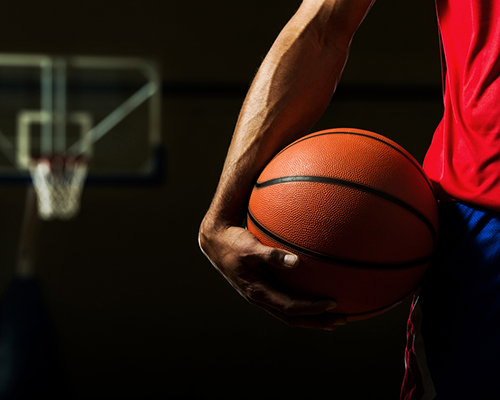 stock photo of basketball and young man close up