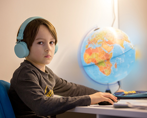 stock photo of boy with globe