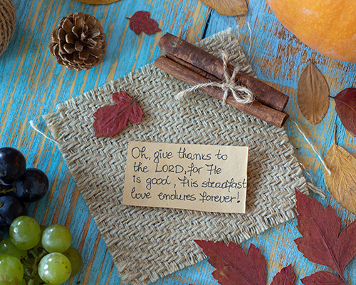 stock photo Thanksgiving table with scripture quote