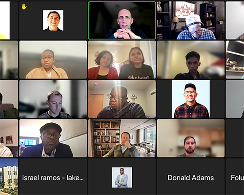 Screenshot of a Zoom meeting with men and women of different ages and ethnicities