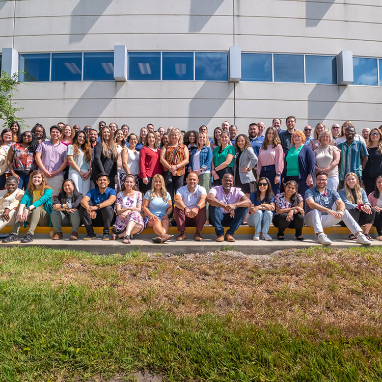 Students photo in front of school