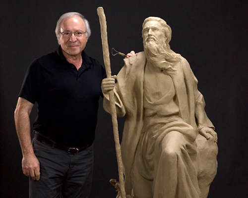 Victor Isaac with Moses sculpture for the 2024 Believe the Promise Camporee