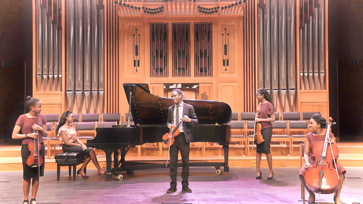 Tsikirai family on stage with instruments