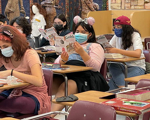 Several students at the Calexico Mission School read the first copy of their new Guide magazine subscription. Photo by Bernardo Sámano