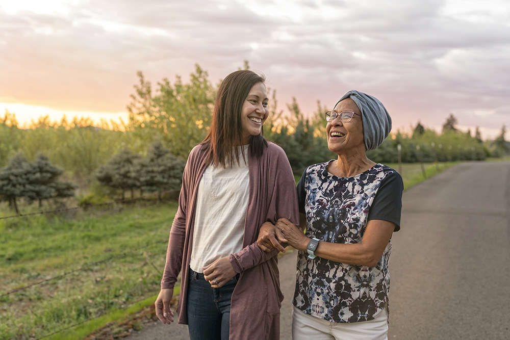 stock photo of two women walking path