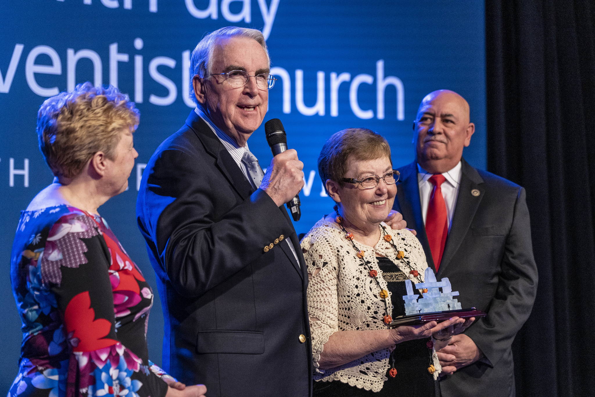 Ron and Karen Flowers, retired directors of General Conference Family Ministries, accept a special lifetime achievement award on Jan. 15, 2019. Photo by Dan Weber