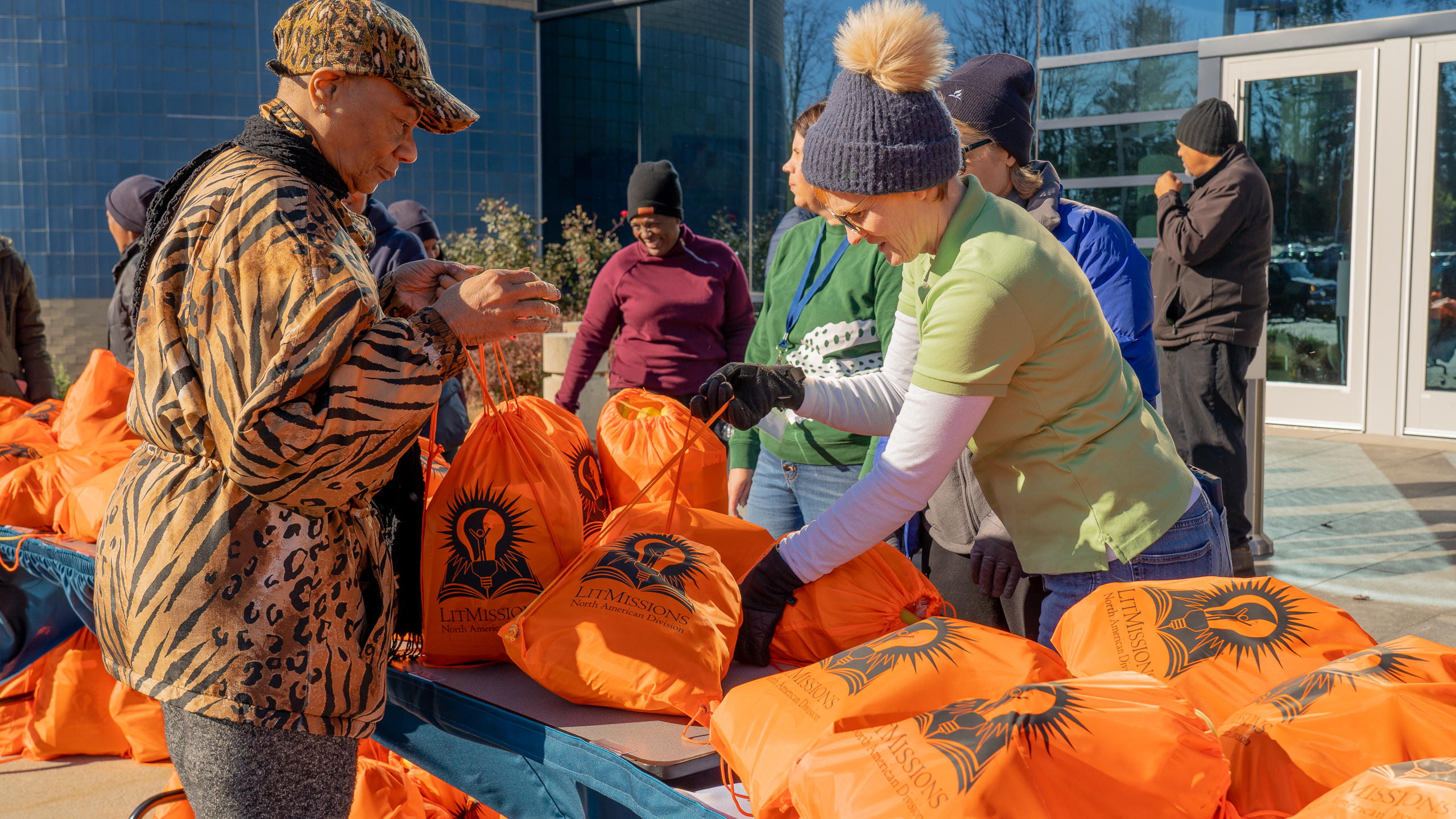 Volunteers serving community members at the North American Division's Thanksgiving fresh produce giveaway