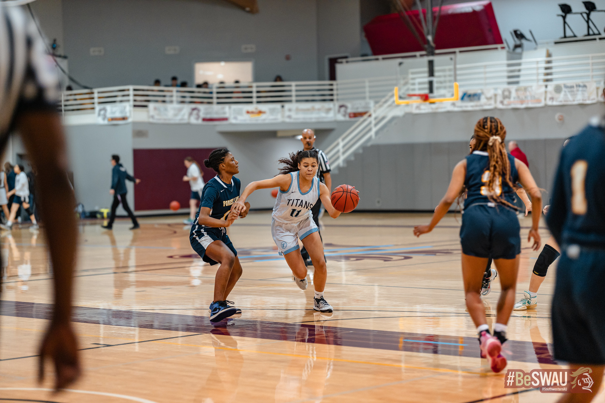 Two high school girls' teams play a game at the SWAU basketball tournament in January 2023. Photo by Southwestern Adventist University