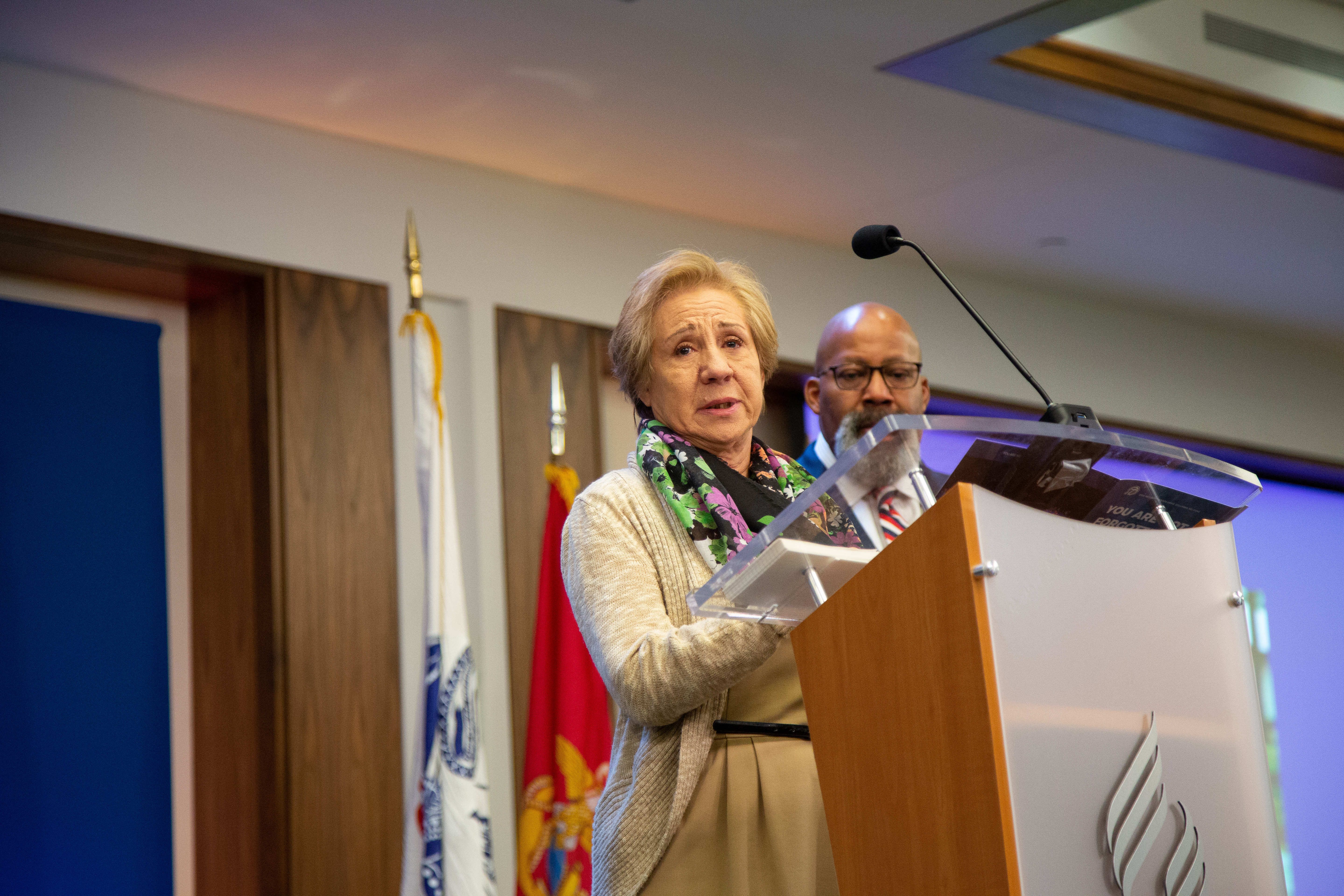 Nancy Mastrapa accepts an award on behalf of her fallen son, Staff Sgt. Stacey Mastrapa, who lost his life while serving in Iraq.