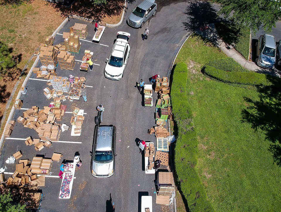 ACS food pantry at the Mt. Olive Seventh-day Adventist Church in Apopka, Florida, prepares to distribute food via drive-thru service. 