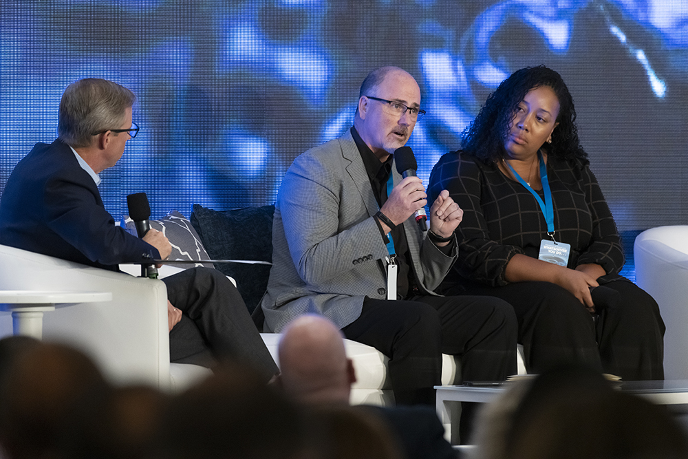 David Banks, Tim Cook, and Jillyan McKinney in panel discussion