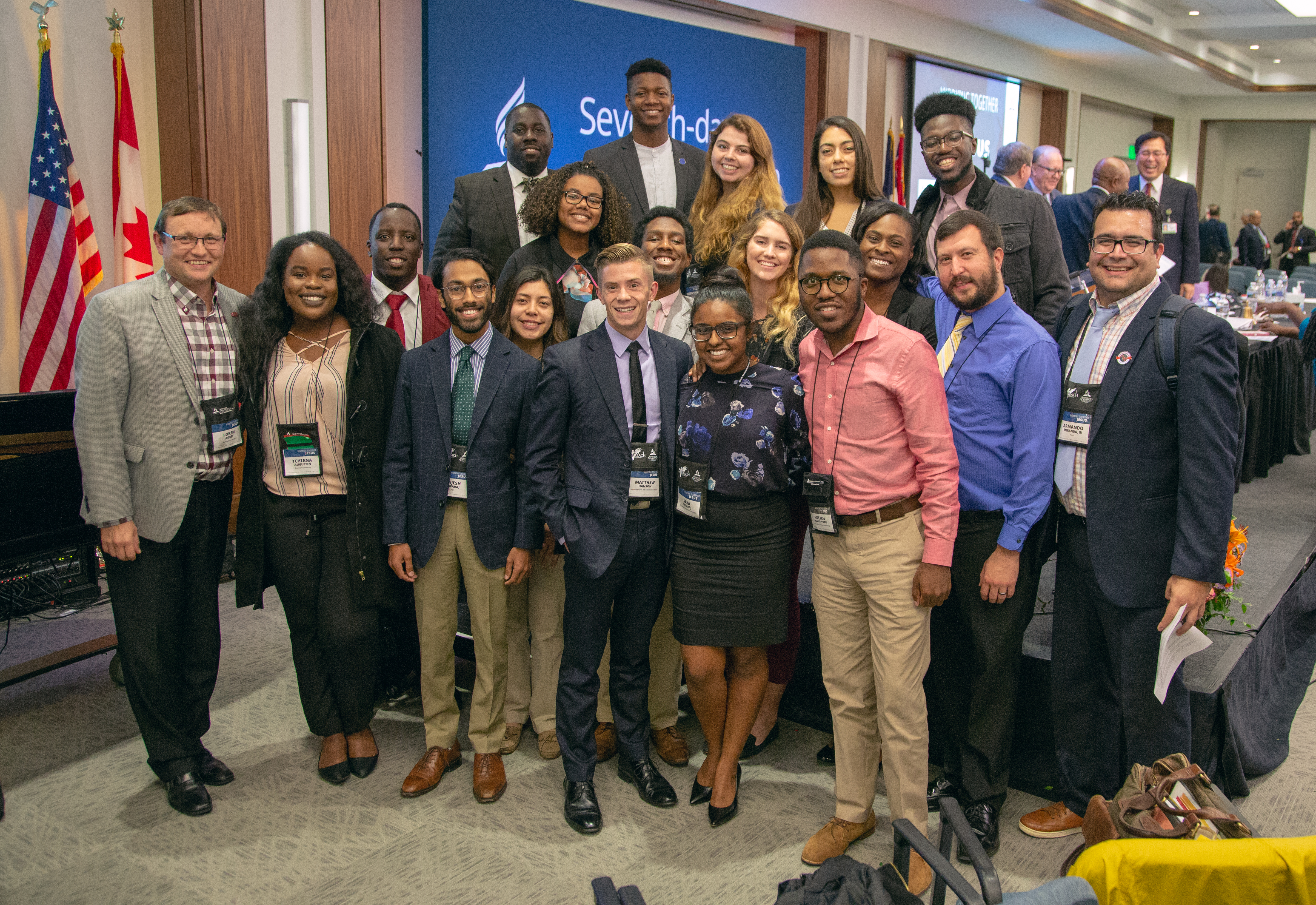 Representatives from the Adventist Intercollegiate Association & Adventist Christian Fellowship pose for a photo after the conclusion of a business meeting. 