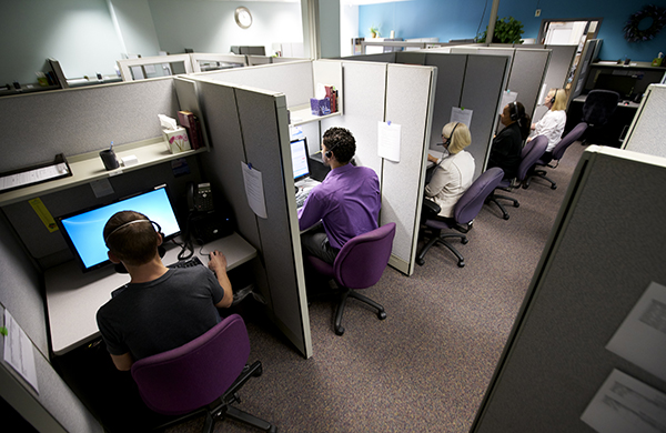 Adventist Information Ministry (AIM) customer service representatives answer calls at the ministry's headquarters in Berrien Springs, Michigan.