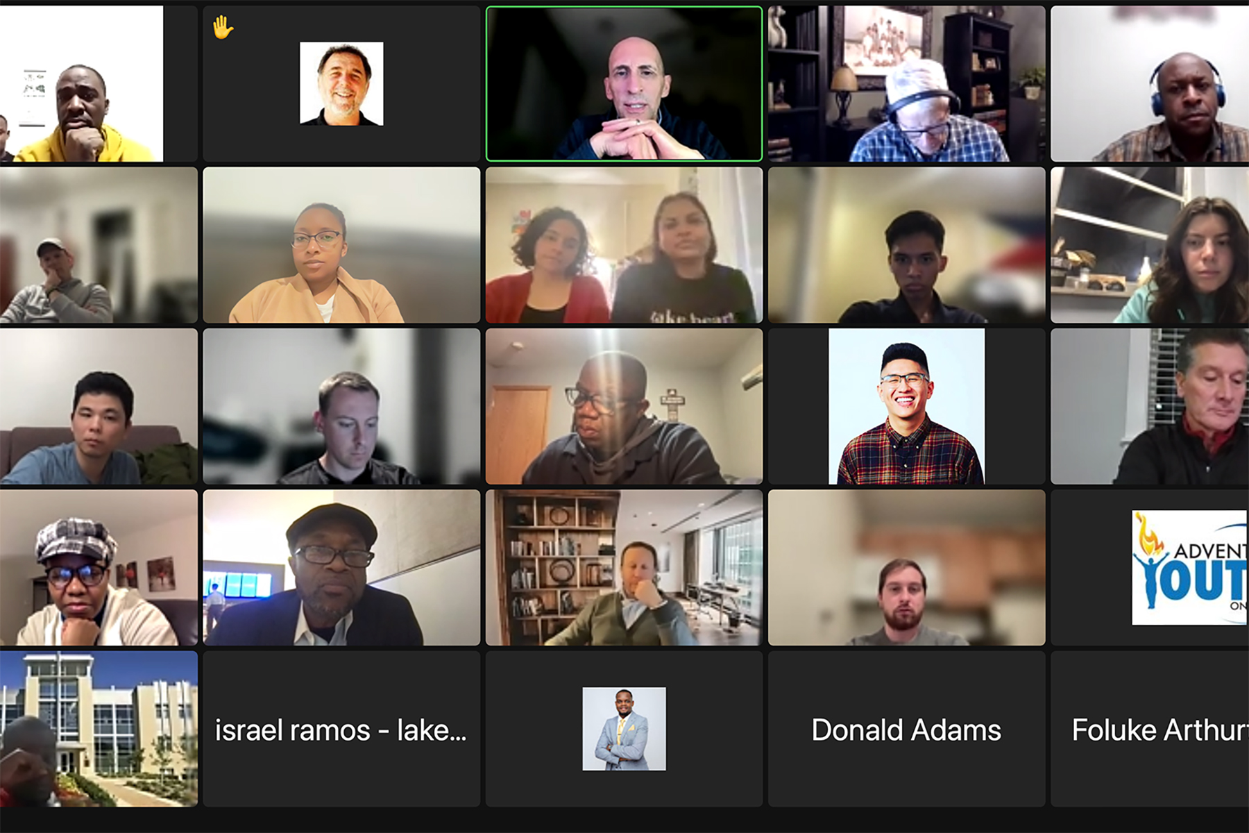 Screenshot of a Zoom meeting with men and women of different ages and ethnicities