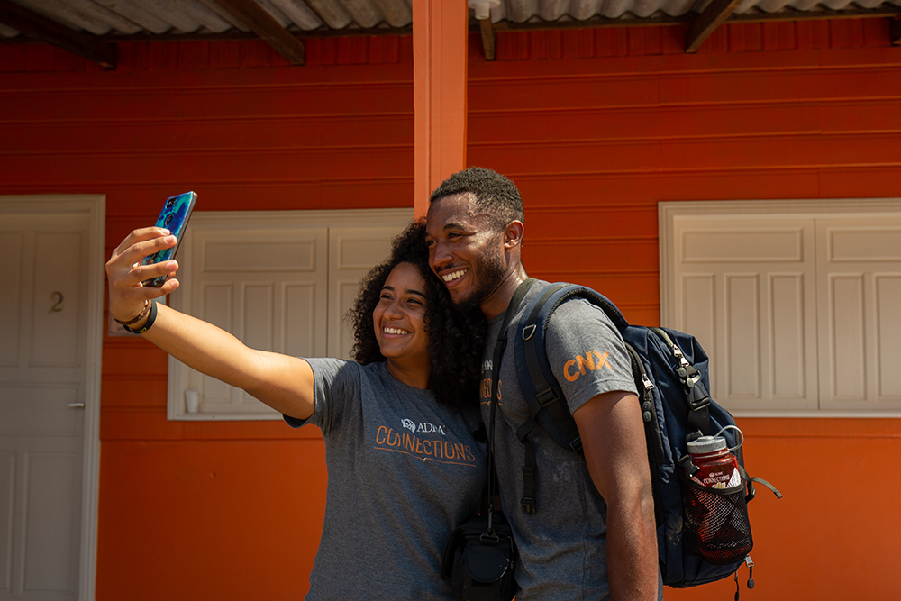 Caleb Akins (R)  who studies Spanish and broadcast journalism at Oakwood University shares a selfie with Raiane Porto (L) who studies music at the Adventist University of Sao Paulo in Brazil (UNASP). 