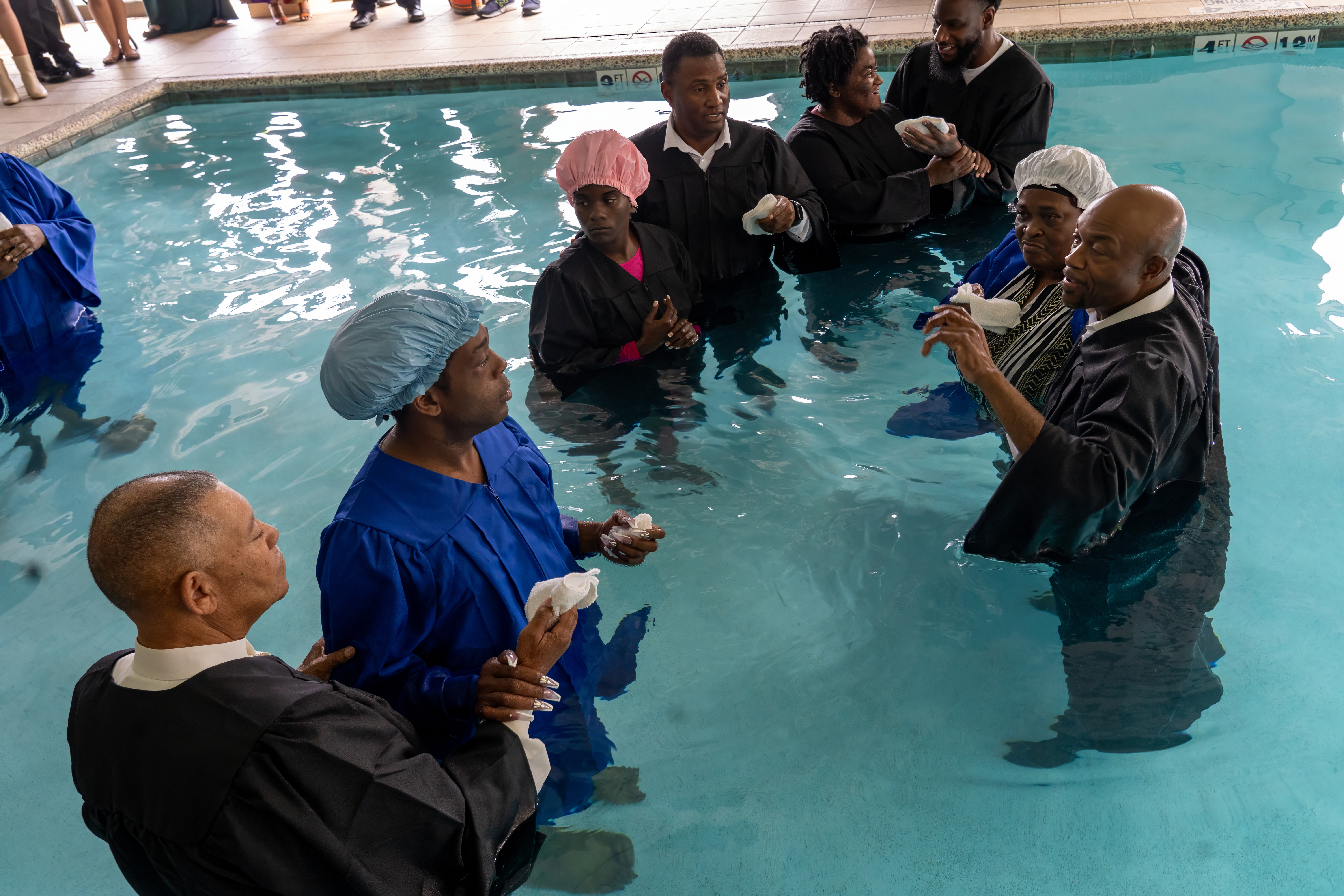 Several people getting baptized
