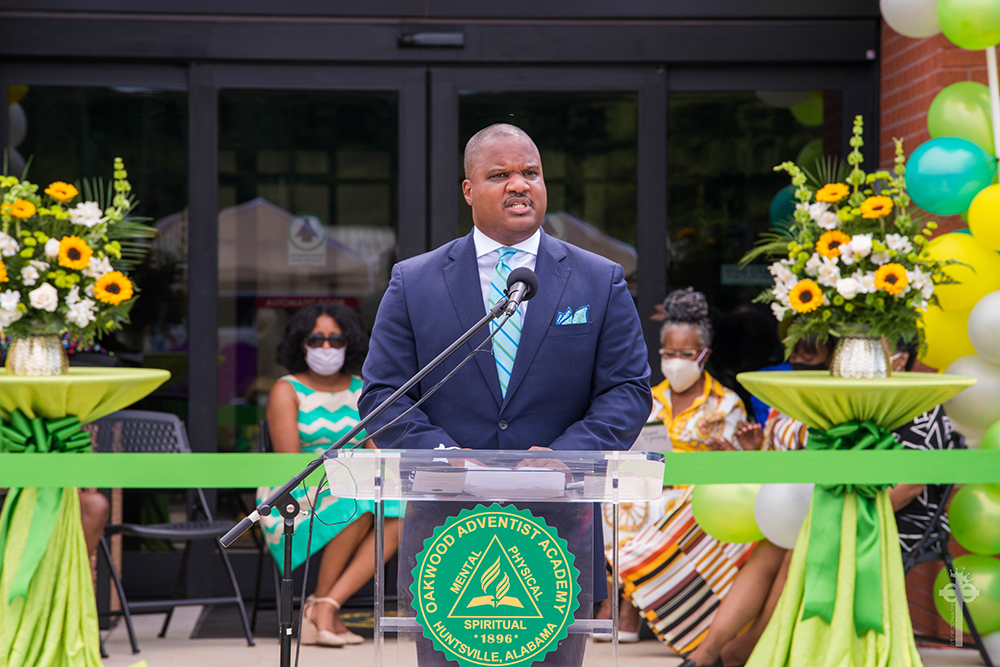 On August 9 Carlton Byrd addresses a group celebrating the Oakwood Adventist Academy bolding project opening 