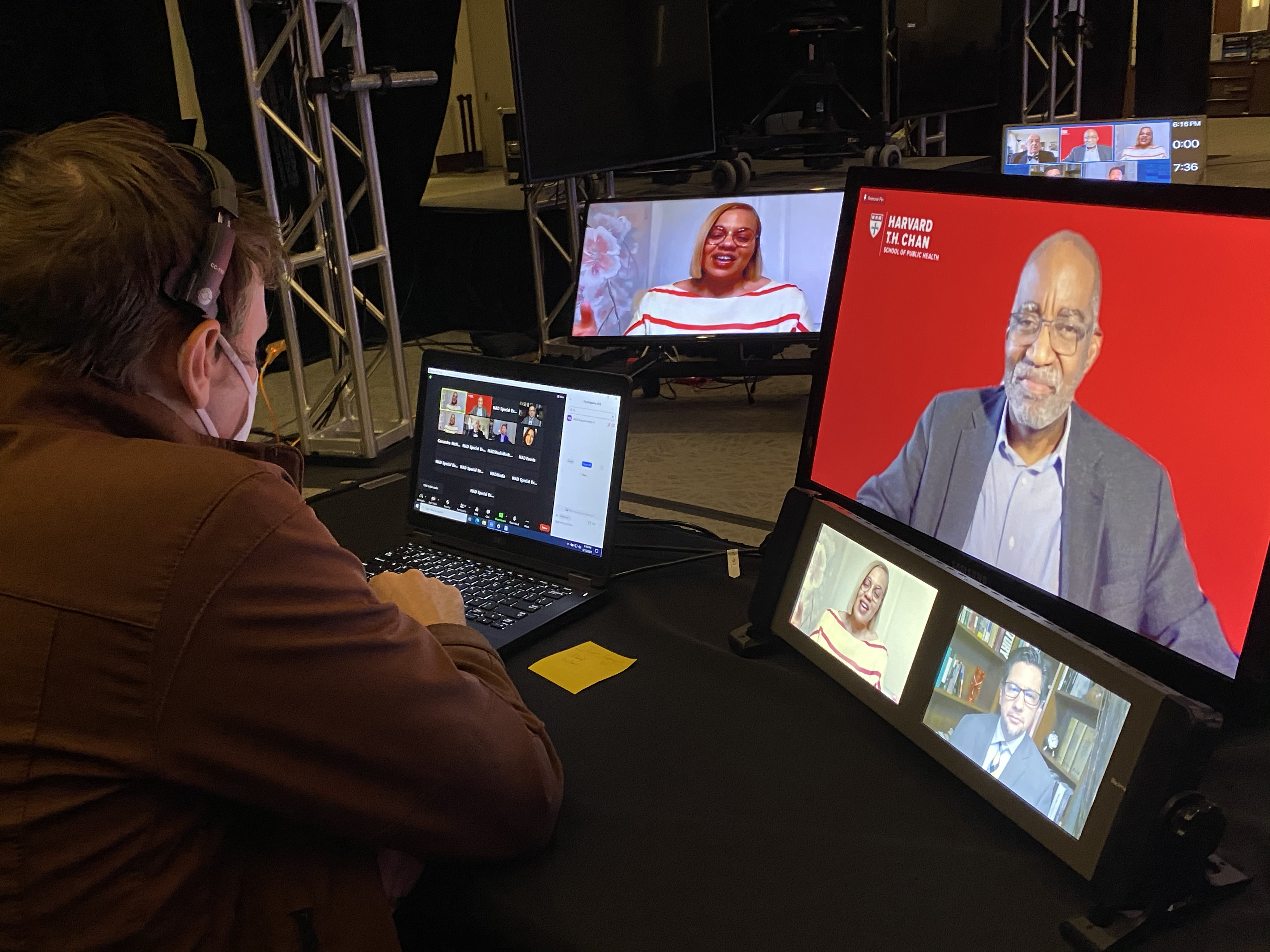 Pieter Damsteegt monitors a feed during the May 15 COVID-19 vaccine symposium a