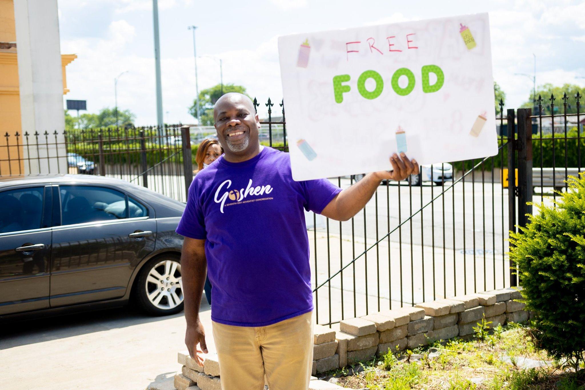 Chicago Goshen church pastor Gordon Graser promotes the food giveaway June 2020 5305.jpg