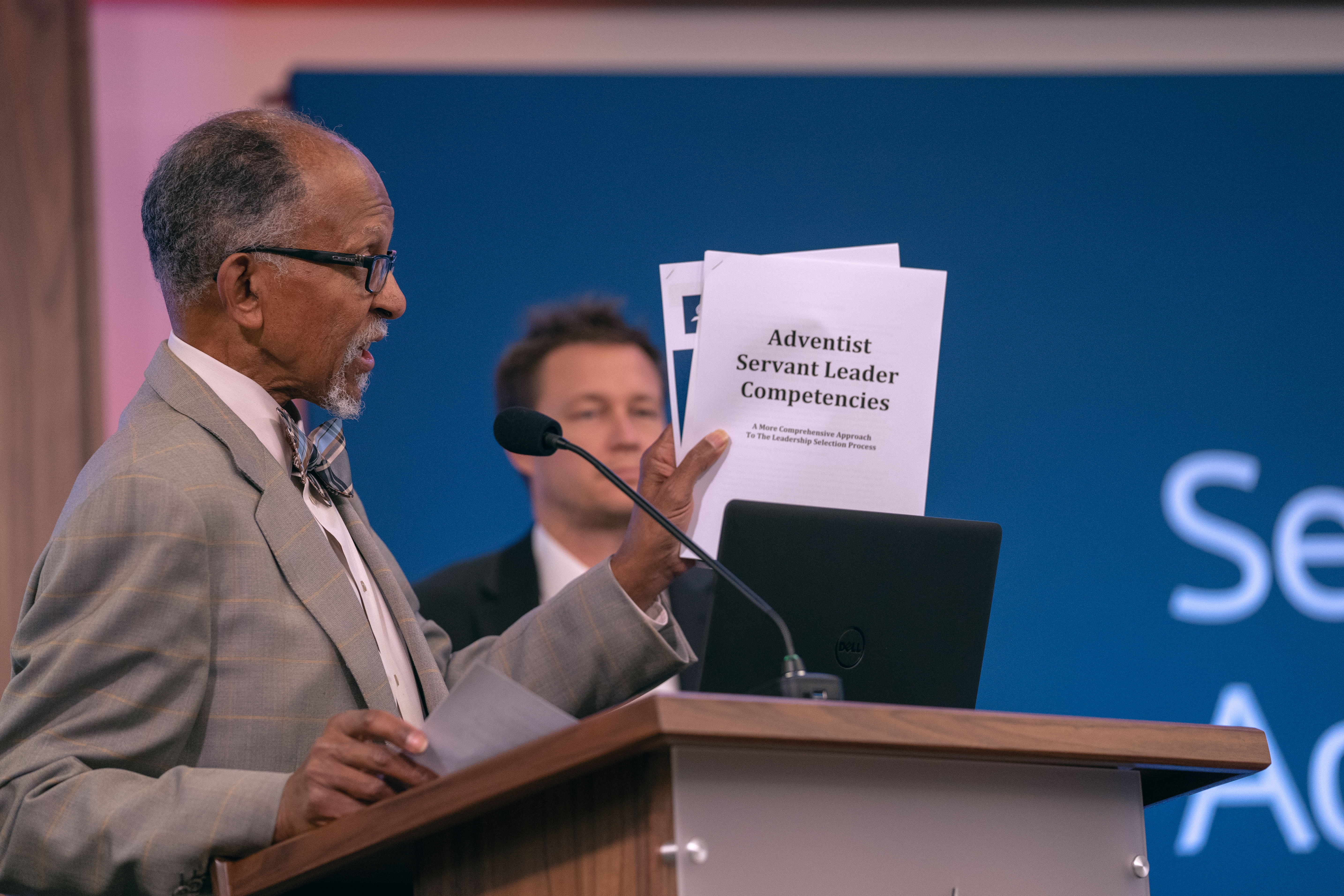 Alvin Kibble, NAD vice president for Big Data + Social Media, Public Affairs and Religious Liberty, Literature Ministries, and Executive Coaching, Training, and Development, holds a report on core competencies that can be used to evaluate candidates for church leadership roles.