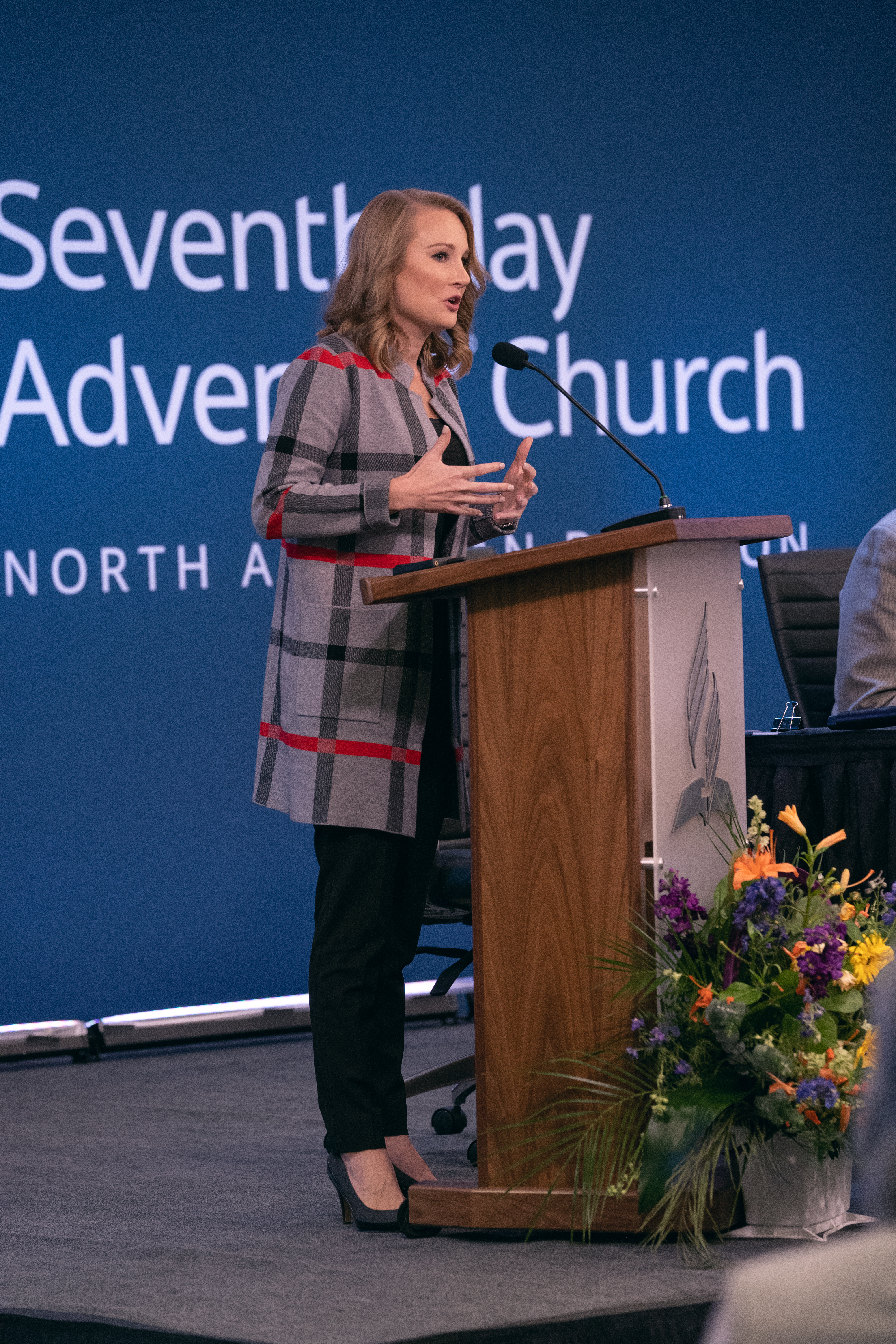 Erica Jones, assistant director of Women’s Ministries, introduces the ministry’s film “Church, Too,” which shares stories of women who have survived various forms of abuse that took place within the Adventist Church. 