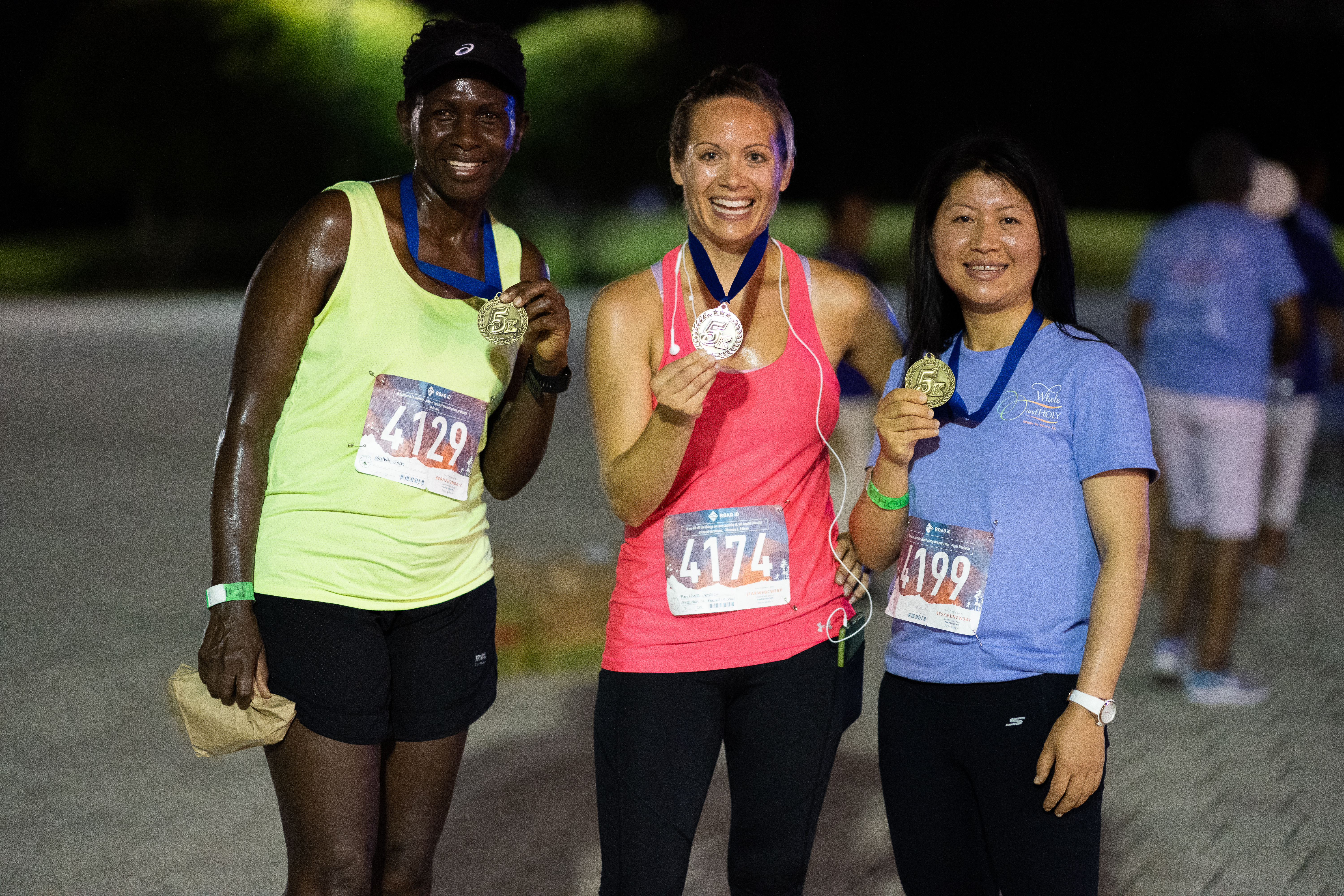 The top three winners of the "Made to Move" 5K race. 