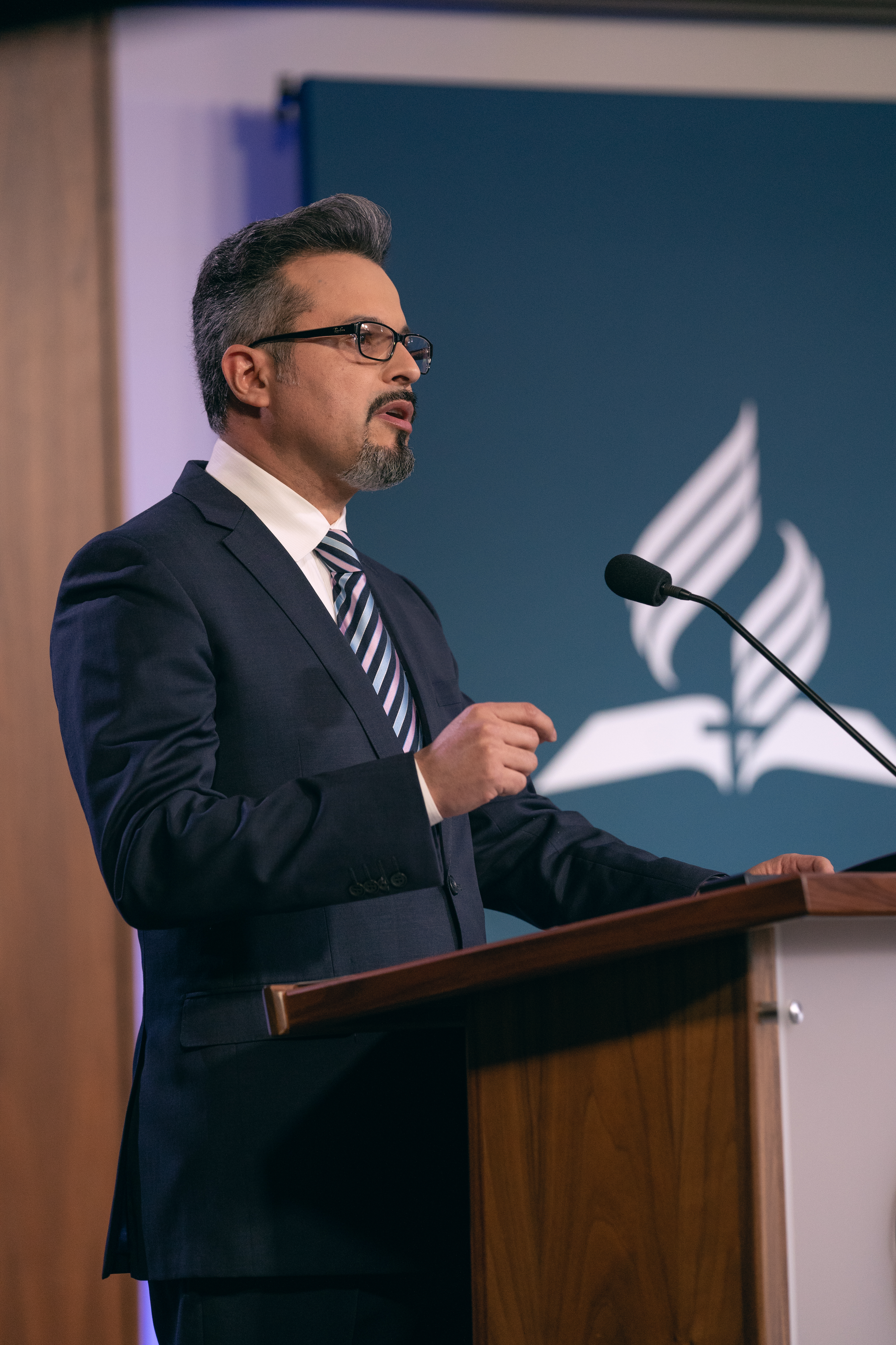 Elden Ramirez, NAD undersecretary, presents a policy amendment related to the size of the division’s Executive Committee. Photo: Pieter Damsteegt/NAD Communication Production