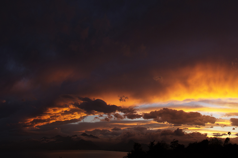 dark clouds and sun stock photo iStock