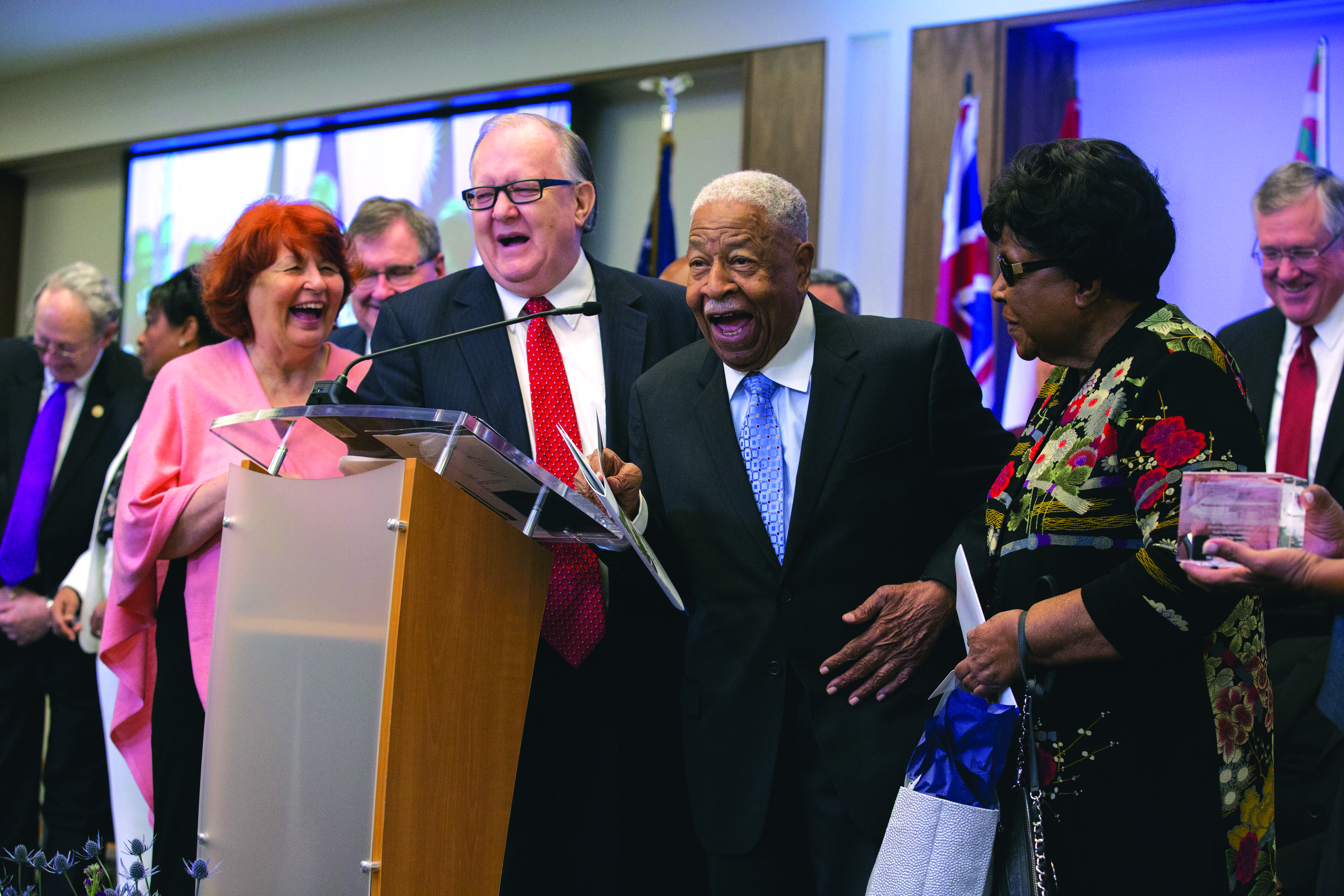 Dan and Donna Jackson present Charles E. Bradford, first and former NAD president, and wife Ethel, with gifts during the NAD headquarters' dedication program on Oct. 26, 2017.