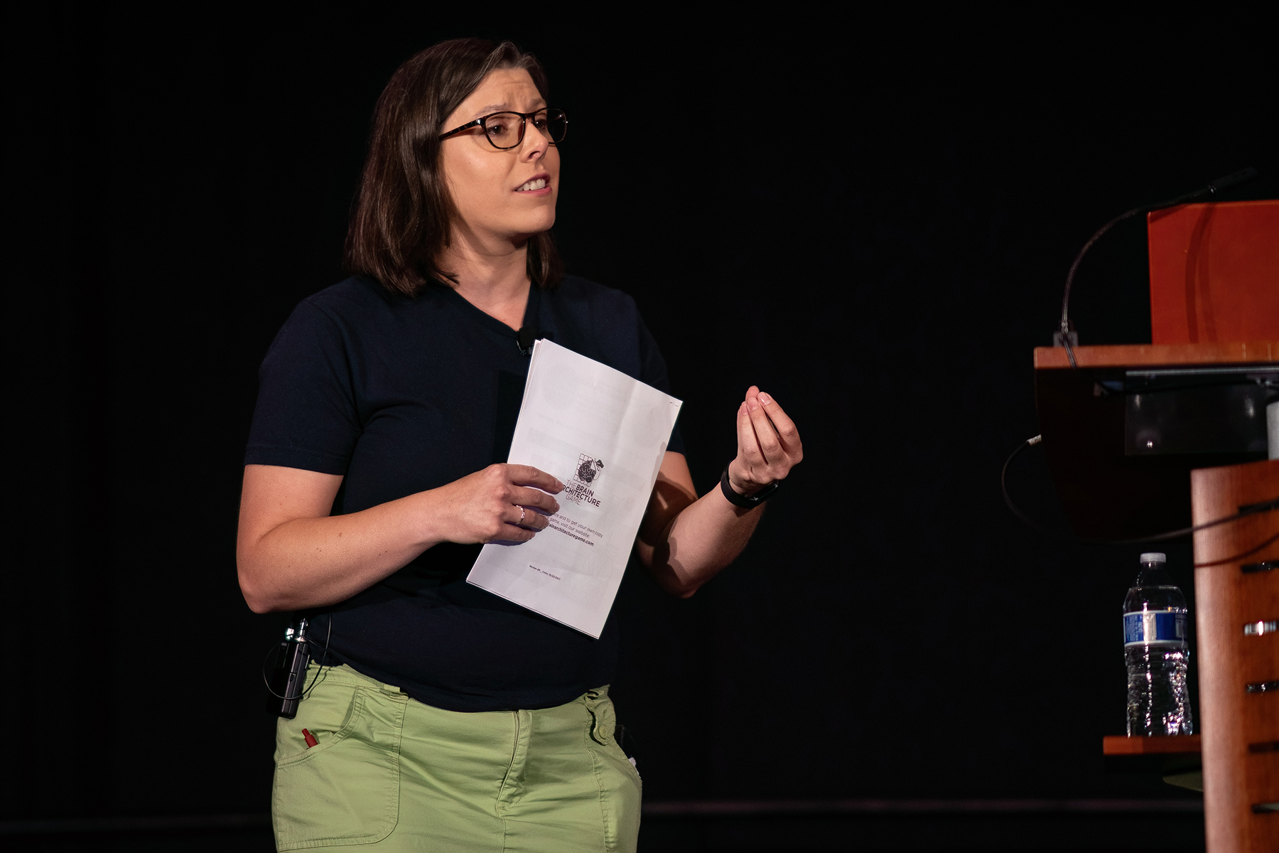 Close-up of a white woman giving a presentation