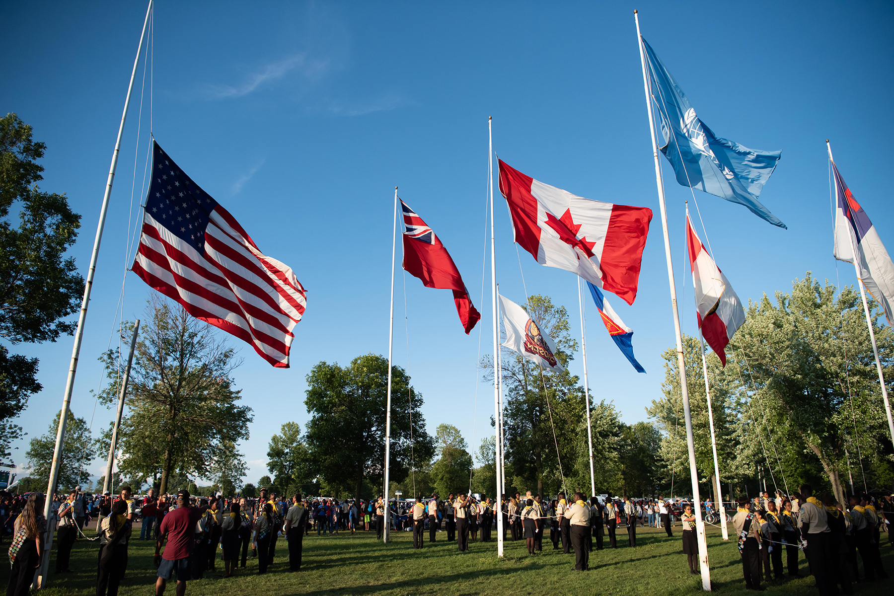 Flags from different countries being raised 