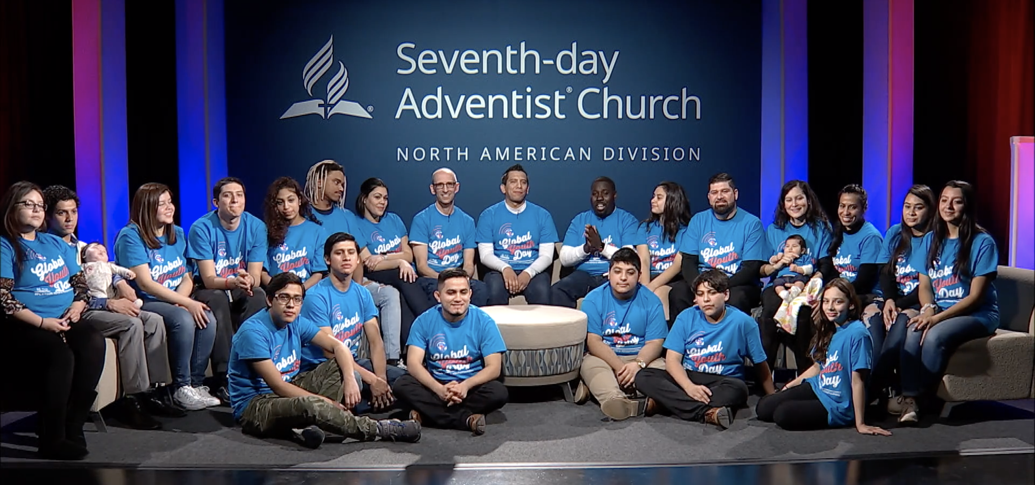 Tracy Wood and Vandeon Griffin, director and associate director of NAD Youth Ministry, sit with participants of Global Youth Day from the Columbia Union. Photo: NAD Communication