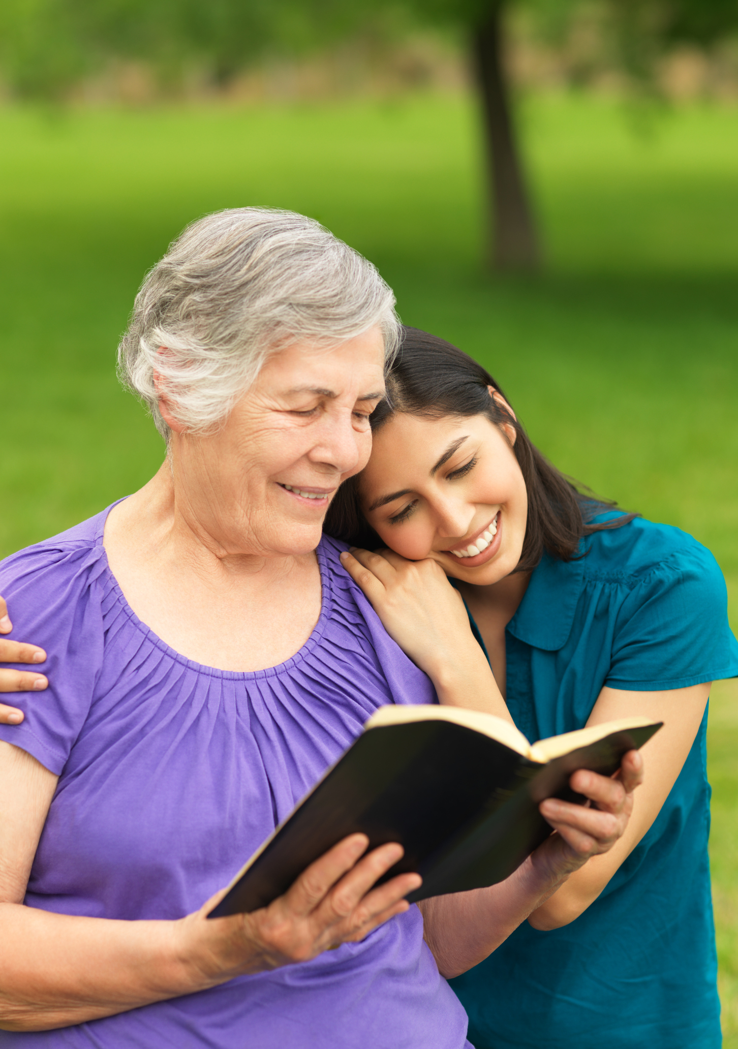 Stock photo of mom and daughter, adult, in Bible study