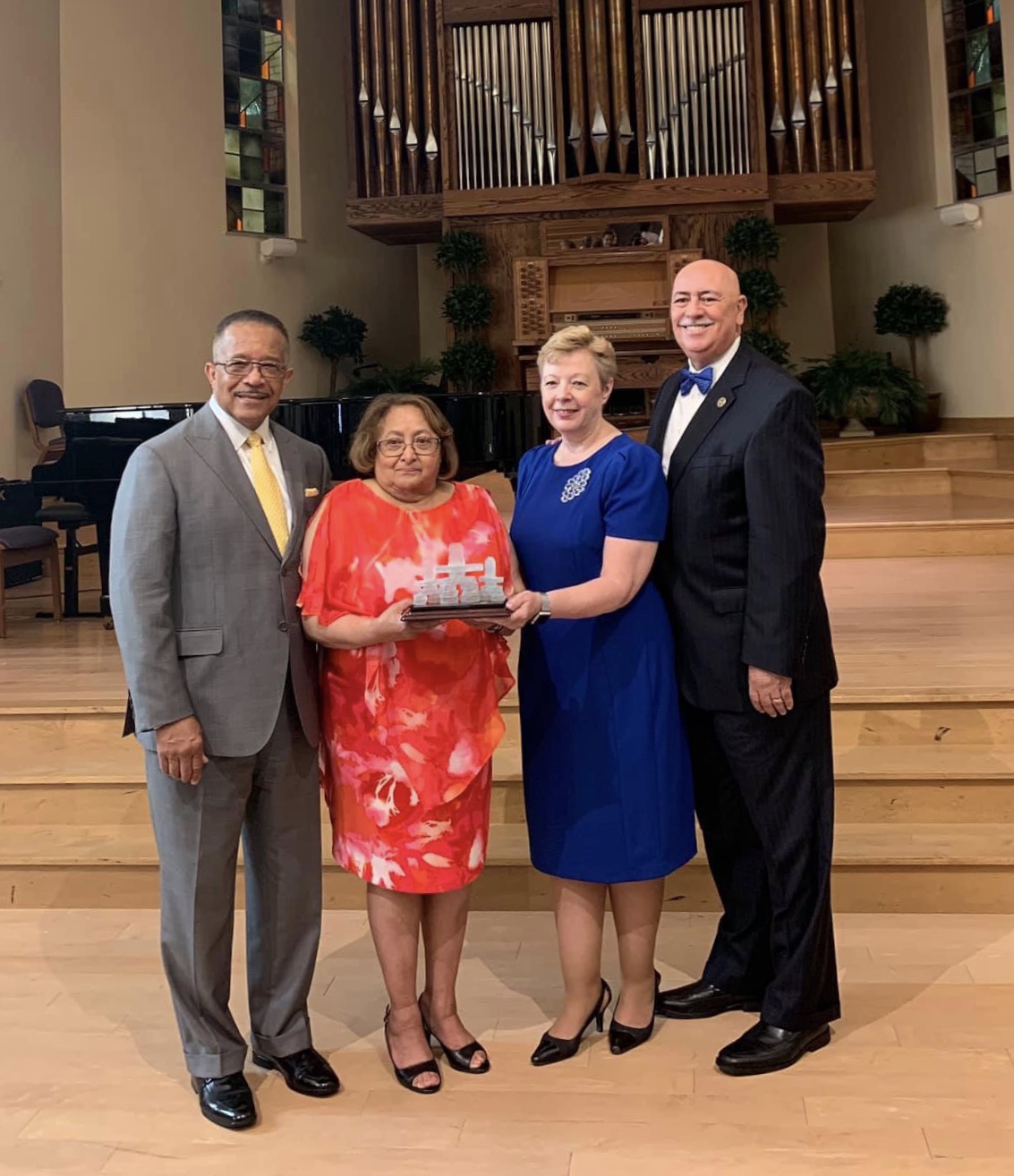 Buford Griffith, Carmen Griffith, Pamela Consuegra, and Claudio Consuegra, pose during an award presentation of the NAD Family Ministries’ annual Family Research and Practice Conference