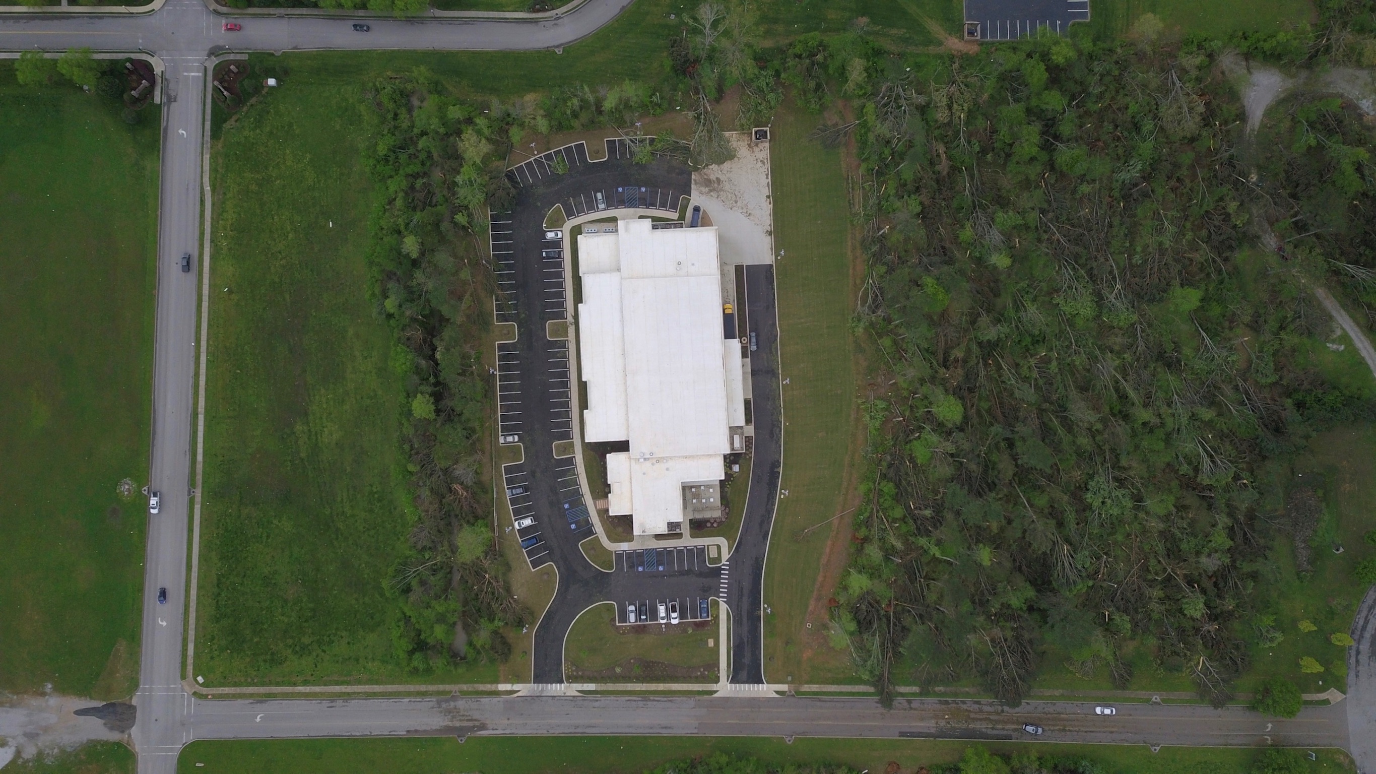 It Is Written drone image showing damage to surrounding areas of the IIW headquarters.