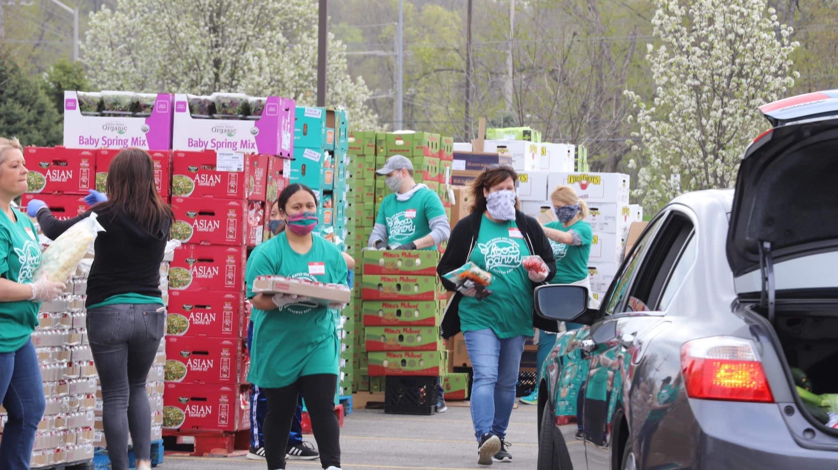 Renewed Hope prepare food for distribution. 