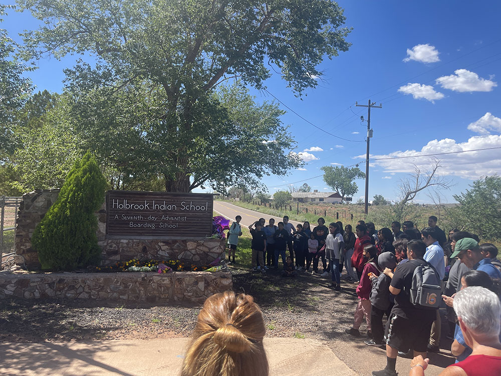 holbrook community gathers at sign