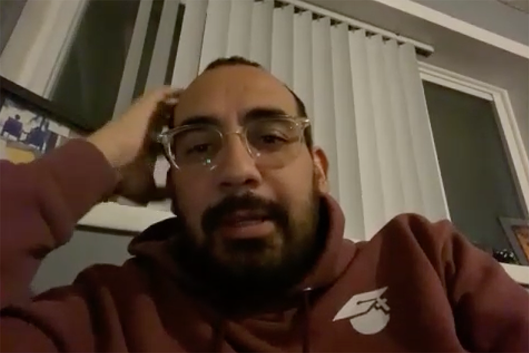 Screenshot of a Hispanic man during a Zoom meeting