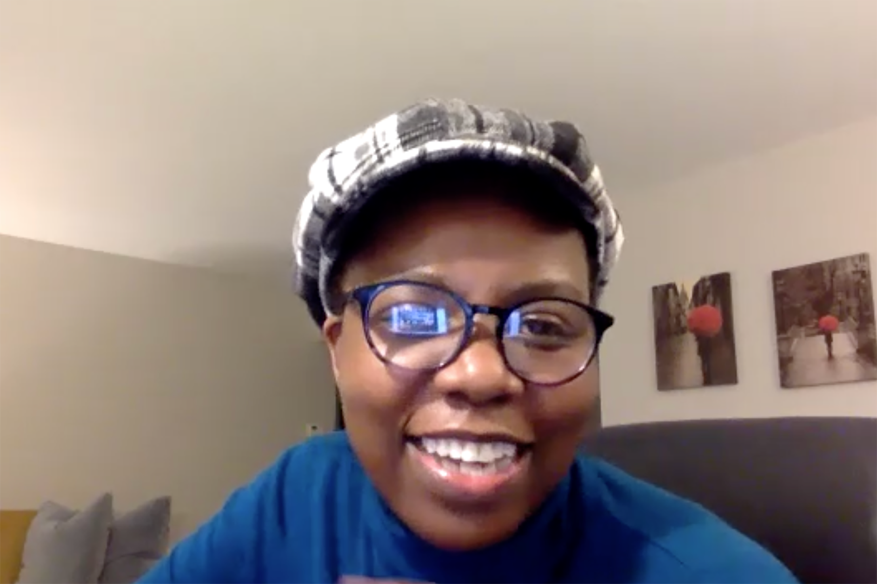 Screenshot of a young black woman taking during a Zoom meeting