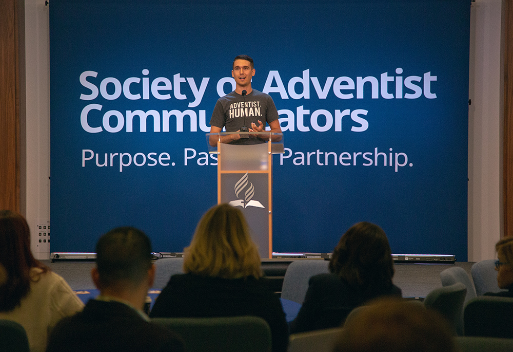 Kaleb Eisele, creator of “Humans of Adventism,” the social media storytelling ministry, tells attendees, “Everything we do, you can do on your cell phone.” 