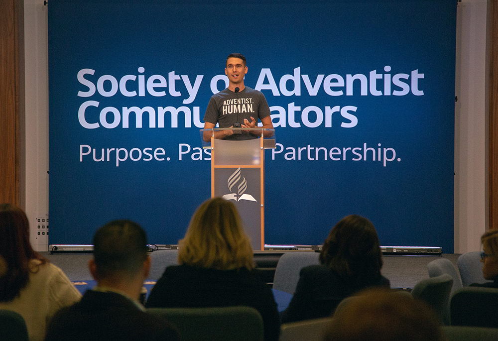 Kaleb Eisele, creator of “Humans of Adventism,” the social media storytelling ministry, tells attendees, “Everything we do, you can do on your cell phone.”