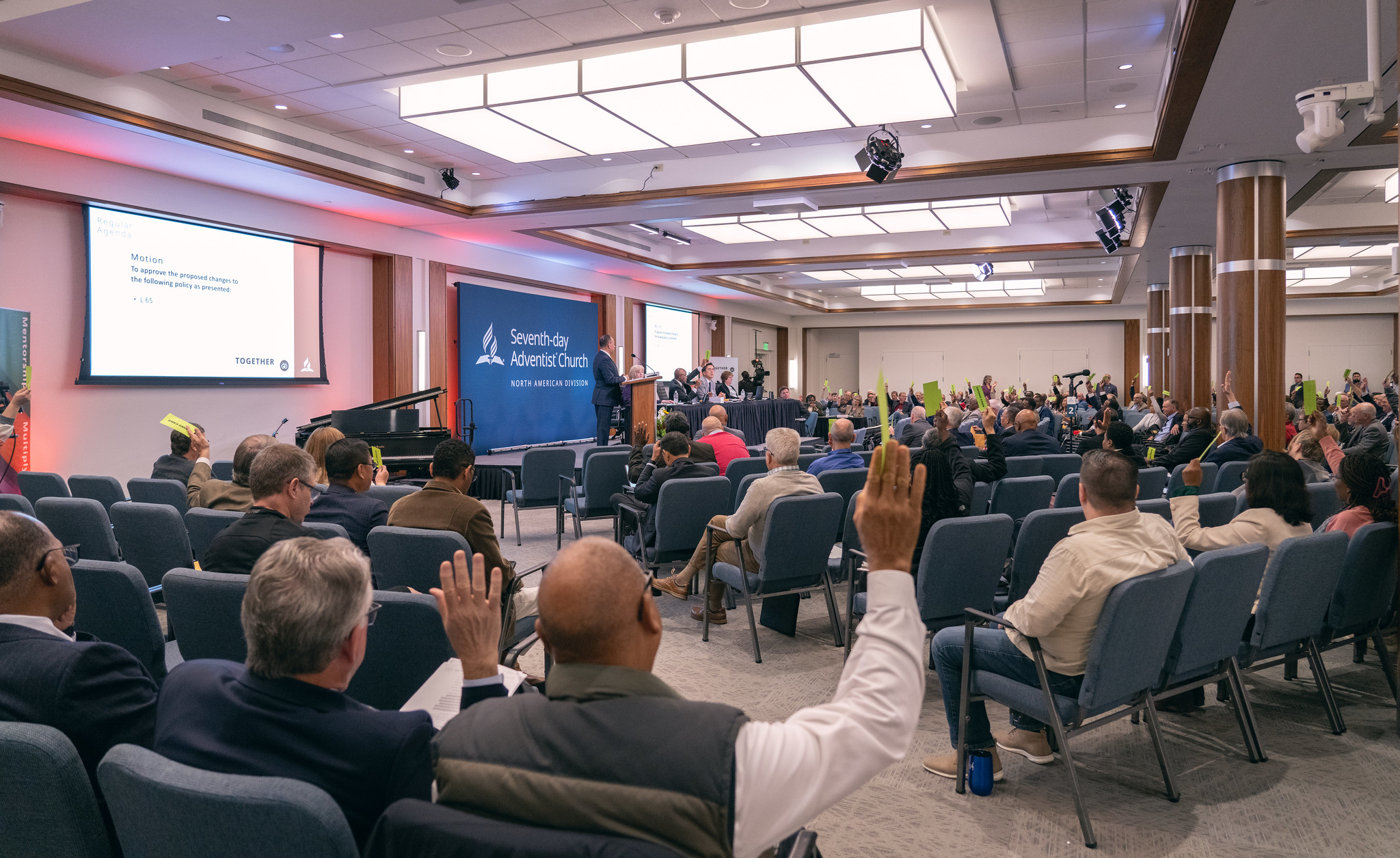 Executive committee members vote on the policy agenda at the 2023 North American Division Year-End Meeting. Photo by Pieter Damsteegt