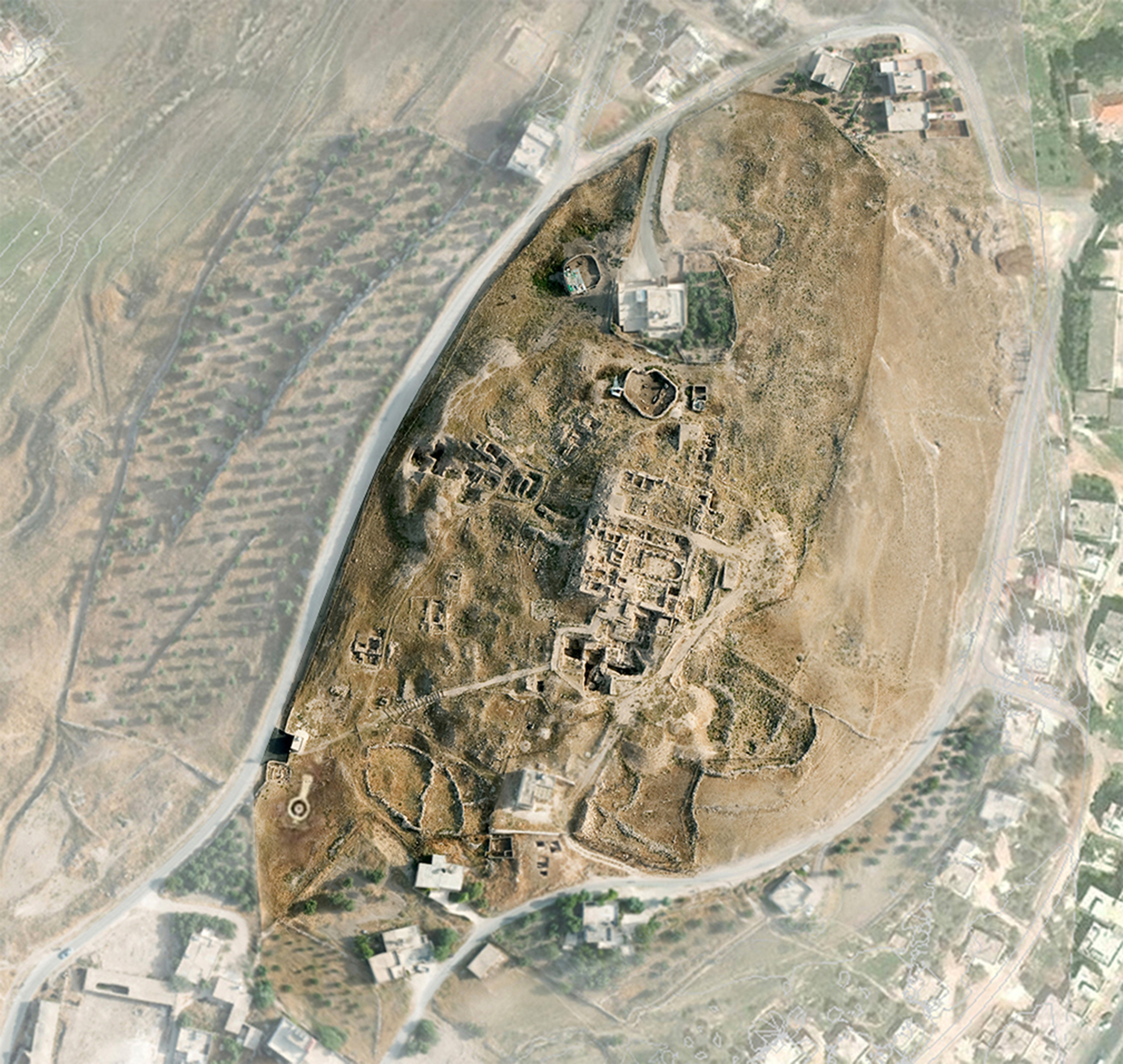 Aerial view of the excavation site Tall Hisban in Jordan co-founded in 1968 by archaeologist Dr. Larry Geraty in whose name an endowment has been established to protect and preserve the site. (Courtesy: Madaba Plains Project)