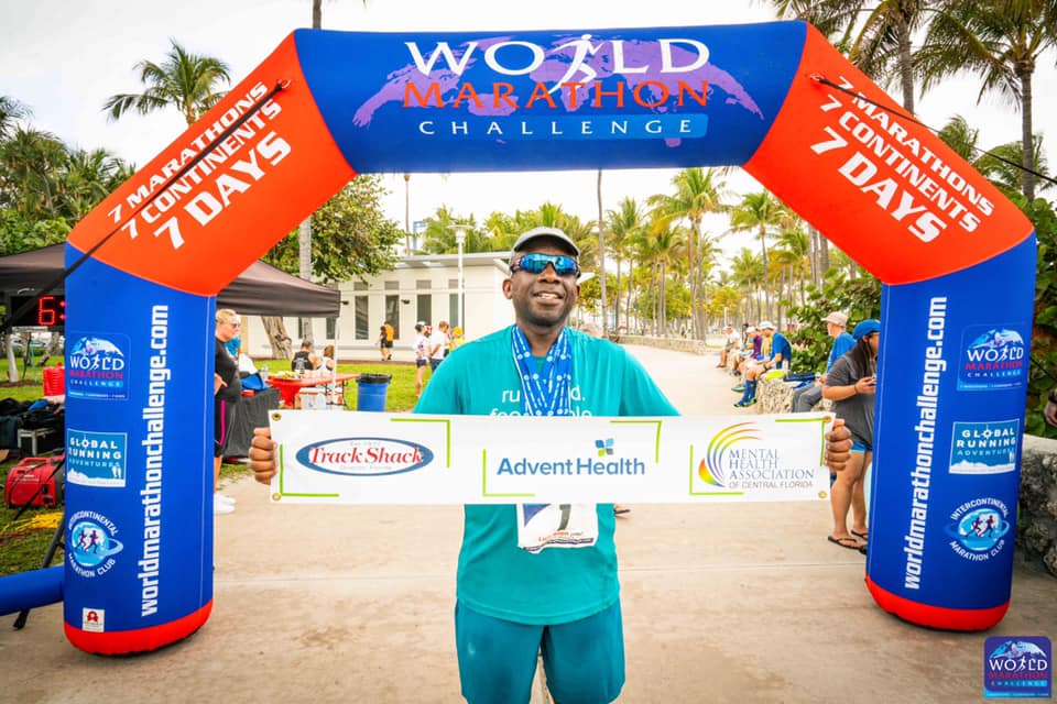 Luis Allen from AdventHealth at marathon finish line