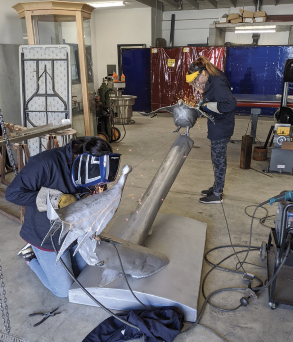 Potts and Firingstoney welding the sculpture