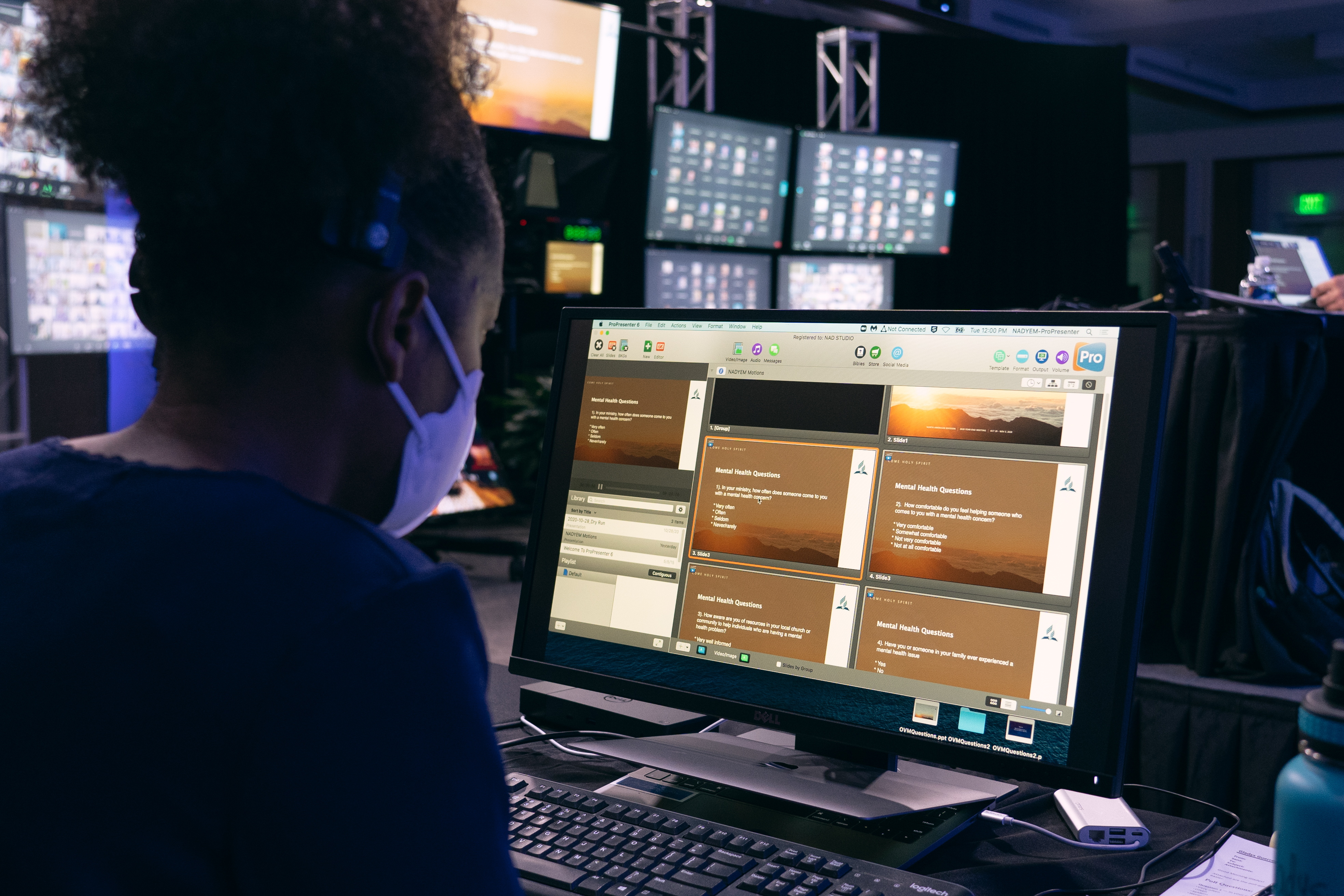 Gladys Guerrero-Cavalheiro, processing assistant for the NAD office of volunteer missions, advances slides containing polling questions as part of the special mental health session on November 3. Photo: Pieter Damsteegt